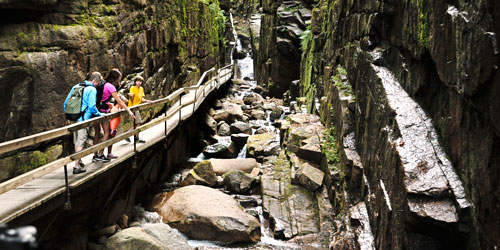 Walking the paths of Flume gorge - Family Activites in New Hampshire - Photo Credit: NH Division of Travel and Tourism Development