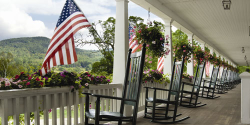 Porch Flags & Rocking Chairs 500x250 - Eagle Mountain House & Golf Club - Jackson, NH