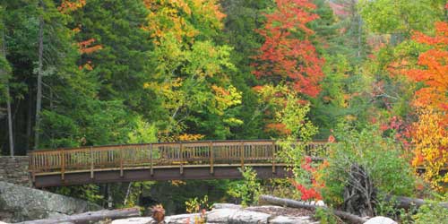 Fall Foliage in New Hampshire - Moose Alley Footbridge - Photo Credit NHDTTD & Ellen Edersheim